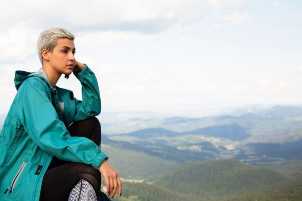 A serene yoga session featuring individuals wearing Beyond Yoga activewear.