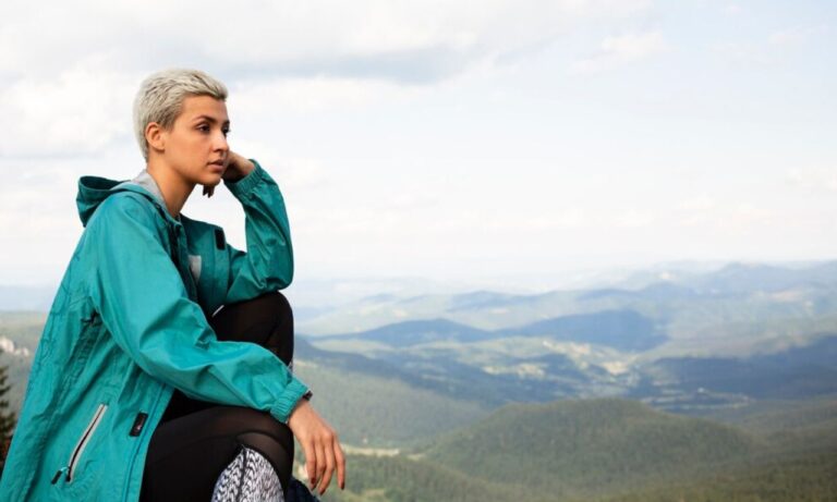 A serene yoga session featuring individuals wearing Beyond Yoga activewear.